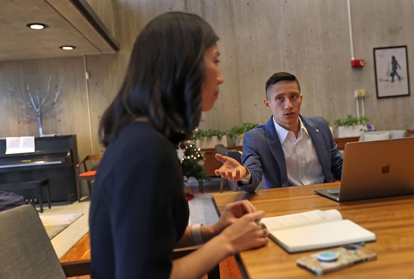 WWW alum and Mayor Michelle Wu's director of speechwriting, Ezra Zwaeli, took part in a brainstorming session in the mayor's office to discuss the video montage that will run during the event.