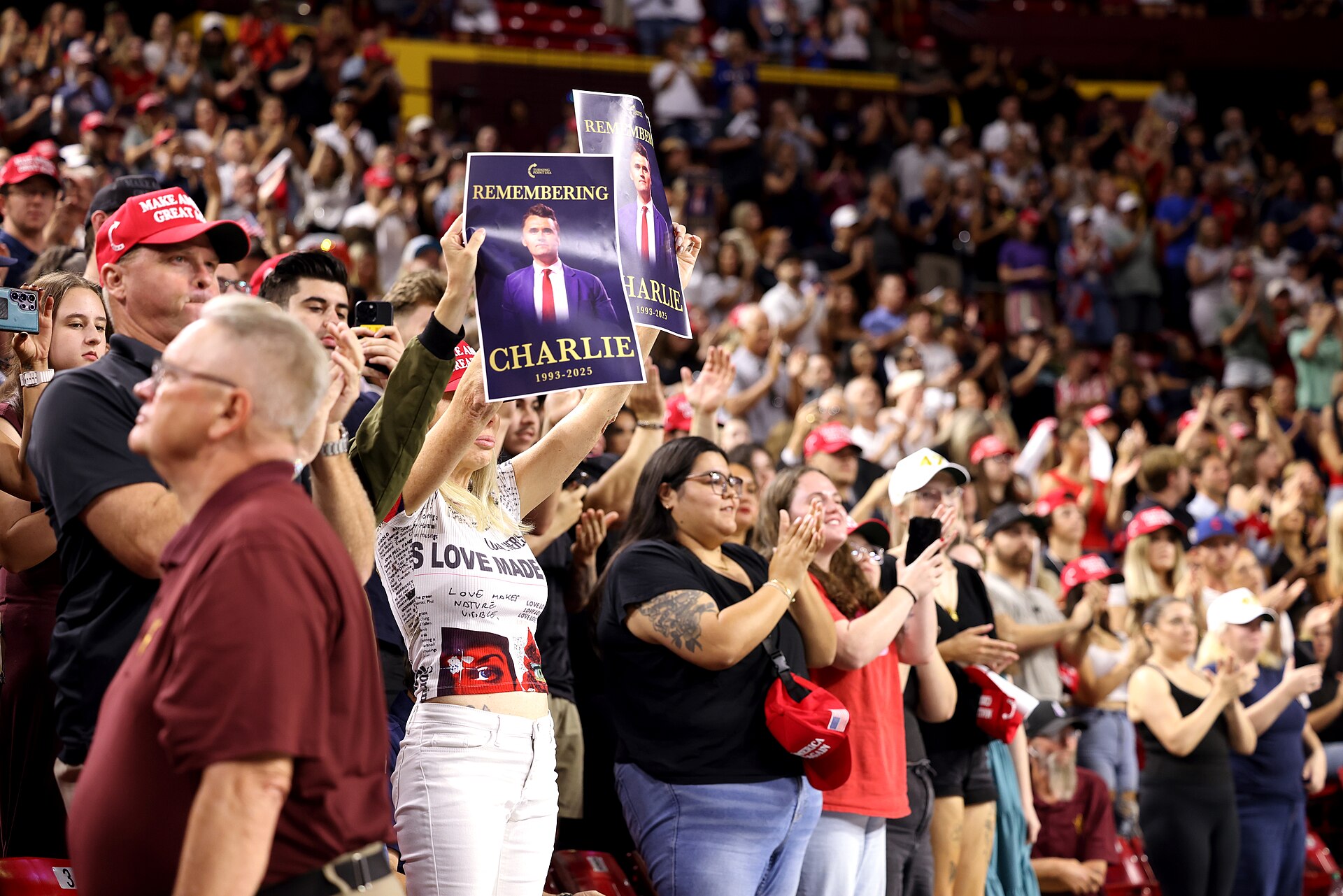 Mourners at the candlelight vigil in honor of Charlie Kirk at Desert Financial Arena at Arizona State University in Tempe, Arizona.